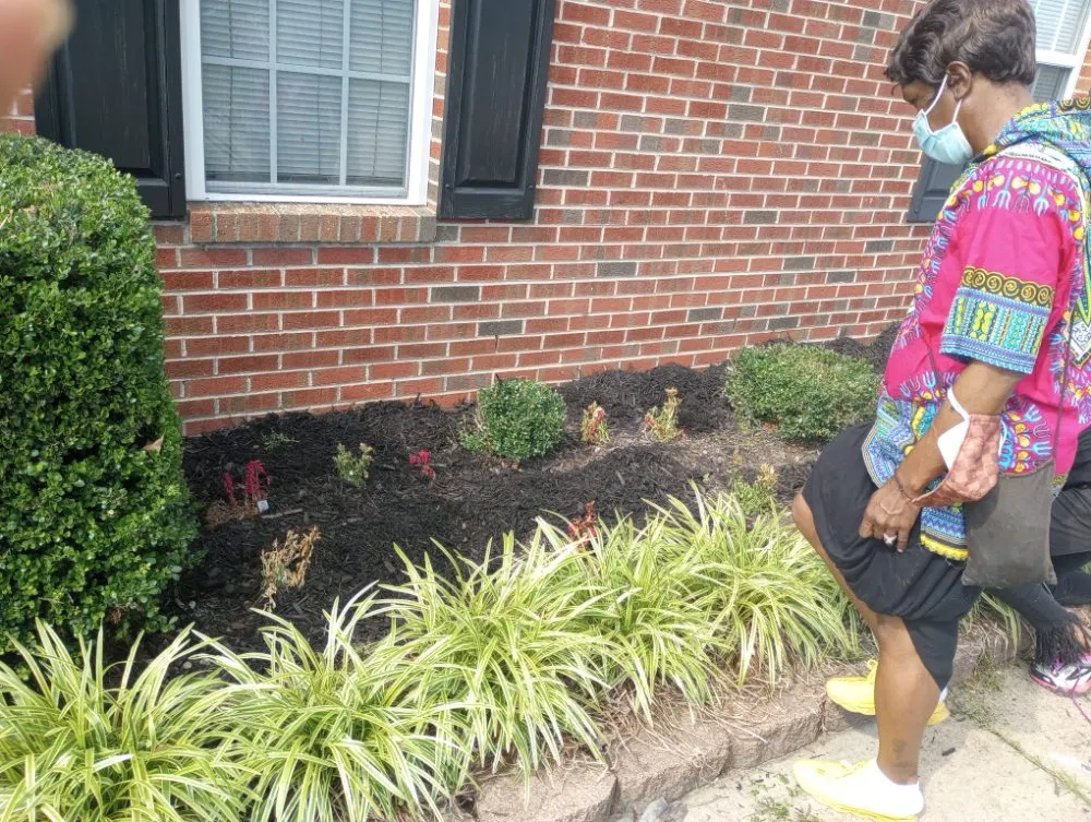 Professional landscape design with custom design in Fayetteville, NC by In God We Trust yard care