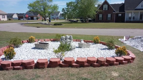 In God We Trust yard care Logo