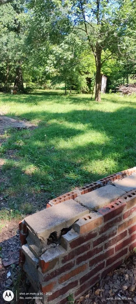 Local landscaping services for outdoor upgrades in Durant, OK by In His Honor Lawn Care Service