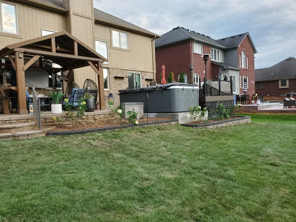 Expert landscape design for year-round maintenance in Berlin Township, MI by In Syts Landscaping