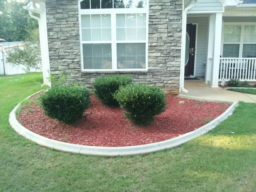 Custom landscape installation for year-round maintenance in Hampton, GA by Incredible Landscaping