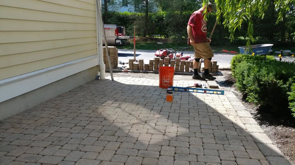 Reliable lawn care service for outdoor upgrades in Marlborough, MA by Infiniti Creative Landscape Design