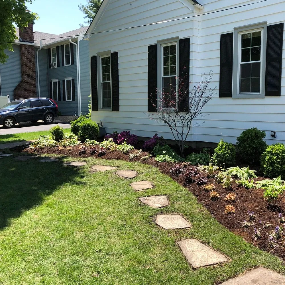 Professional lawn mowing service in St. Charles, IL by INNovation Studio Landscape
