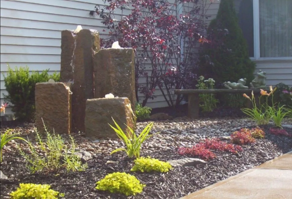 Professional yard cleanup service for year-round maintenance in North Ridgeville, OH by Innovative Designs