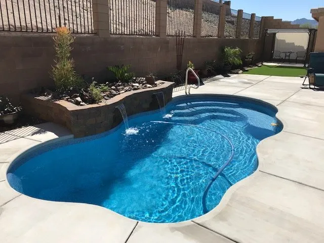 Reliable lawn mowing service for residential properties in Kingman, AZ by Innovative Stoneworks and Landscaping