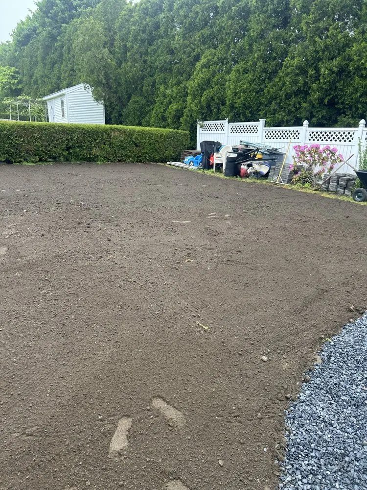 Professional yard maintenance for homes in Somerset, MA by Inside Out Construction