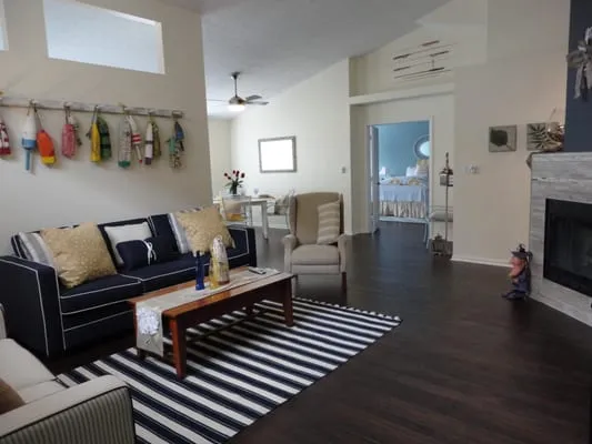 Inside Out Home Remodeling and Lawn Service Logo