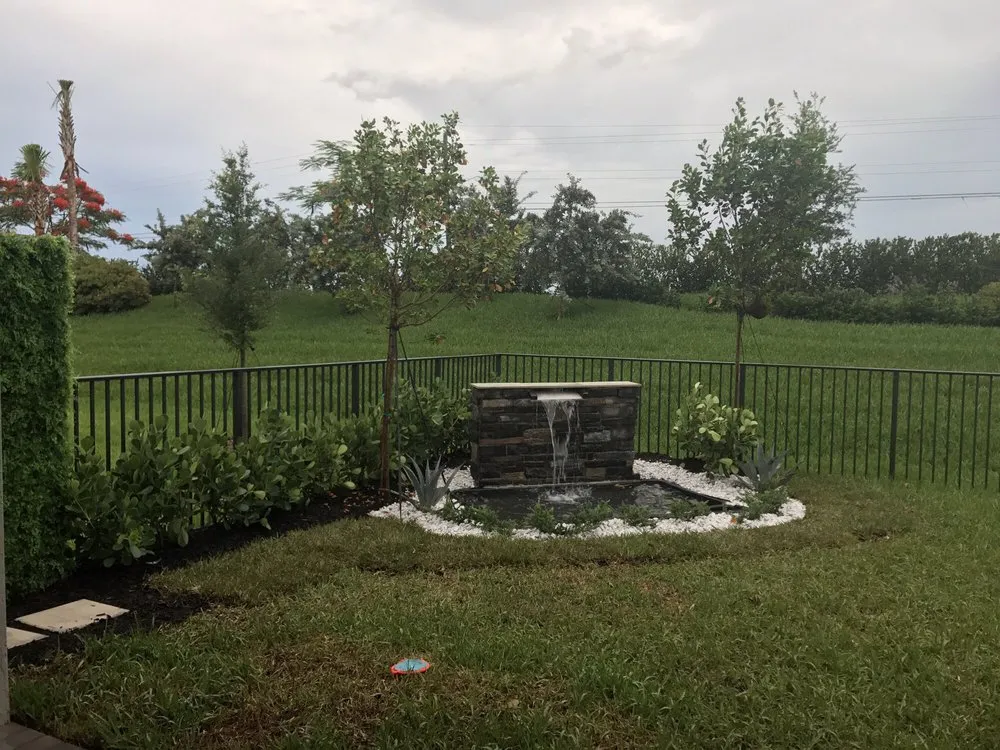 Custom yard cleanup service with custom design in Pompano Beach, FL by Integrated Landscaping