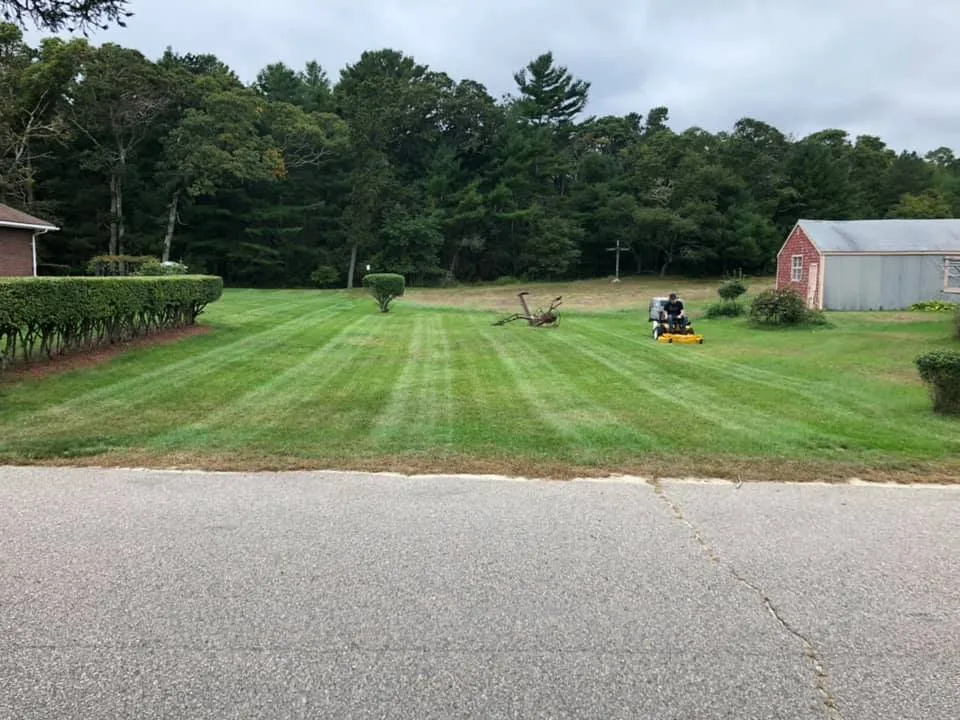 Custom outdoor landscaping with custom design in West Wareham, MA by Integrity First Landscaping