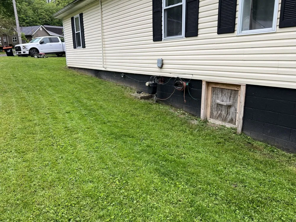 Custom yard cleanup service for outdoor upgrades across South Point, OH - Integrity Home Solutions