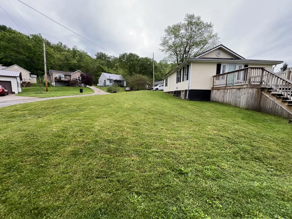 Expert lawn mowing service for outdoor upgrades in South Point, OH by Integrity Home Solutions