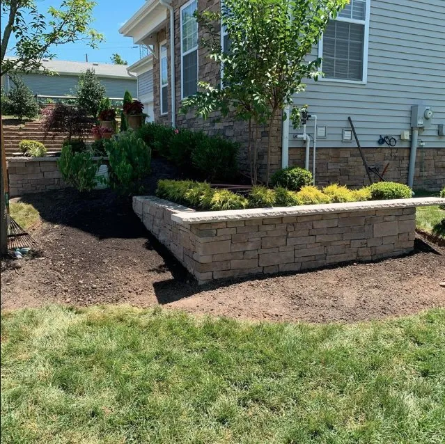 Reliable yard maintenance for year-round maintenance in Monroe Twp, NJ by Intelliscape Landscaping and Lawn care