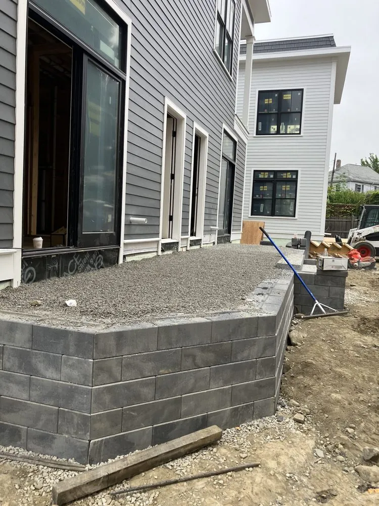 Affordable lawn mowing service with custom design in Lynn, MA by Inter Landscaping & Construction