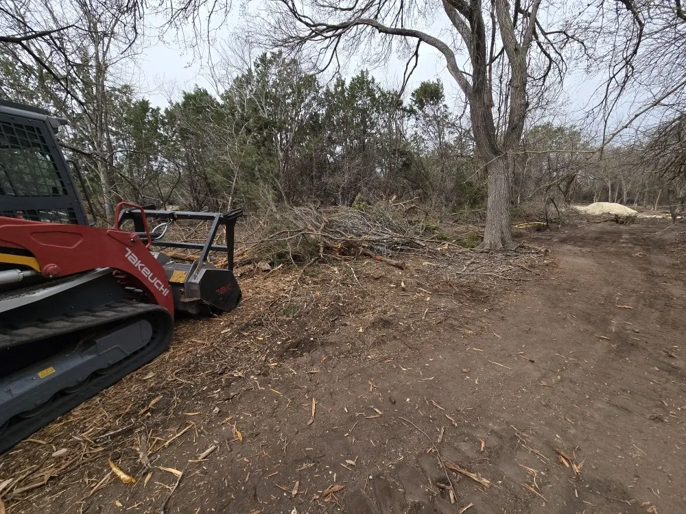Affordable landscape design in Kyle, TX by Intex Rock & Cedar Solutions