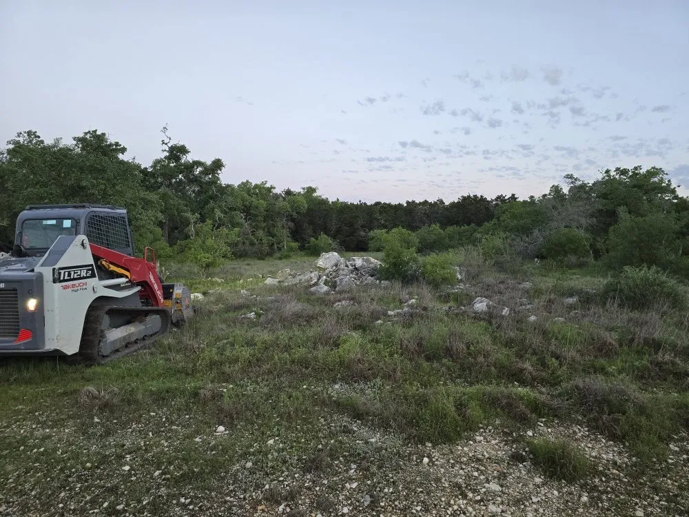 Custom lawn care service for residential properties in Kyle, TX by Intex Rock & Cedar Solutions