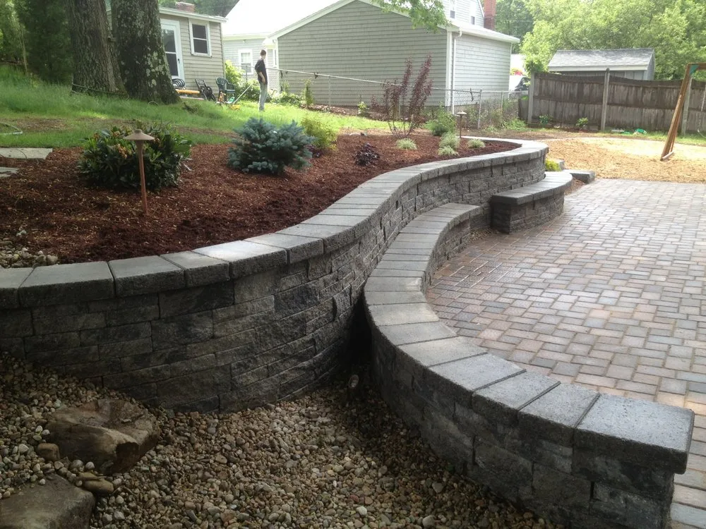 Custom landscape design for year-round maintenance in Merrimack, MA by Inventive Landscape Creations