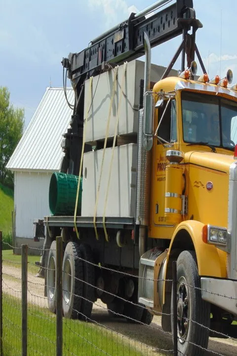 Custom lawn care service for residential properties in Maquoketa, IA by Iowa Concrete Products And Monuments