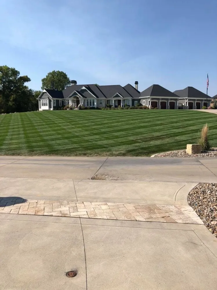 Trusted lawn mowing service in Des Moines, IA by Iowa Lawn & Landscape