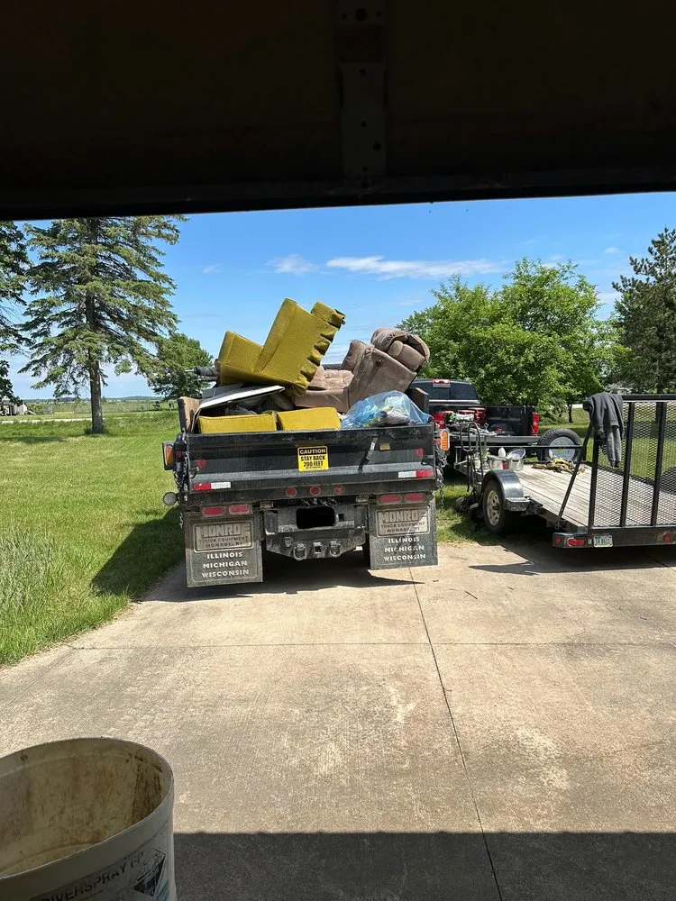 Custom landscape installation in Fairbank, IA by Iowa Trucking & Junk Removal