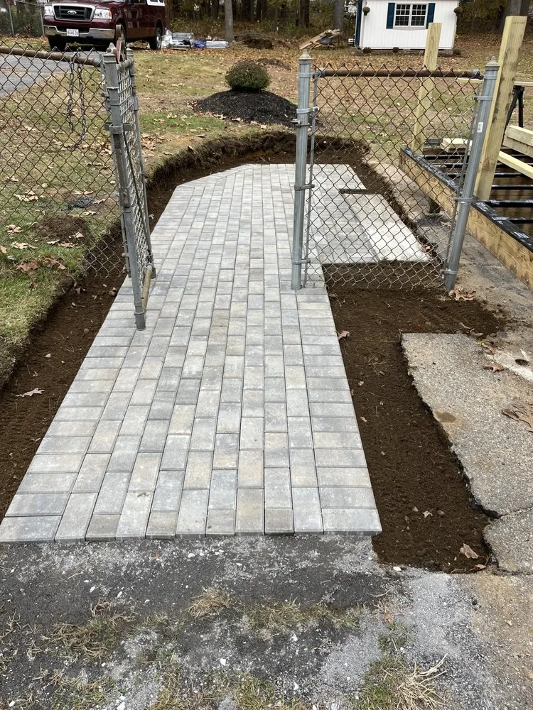 Affordable yard cleanup service for homes in Billerica, MA by Ippolito Landscape & Construction