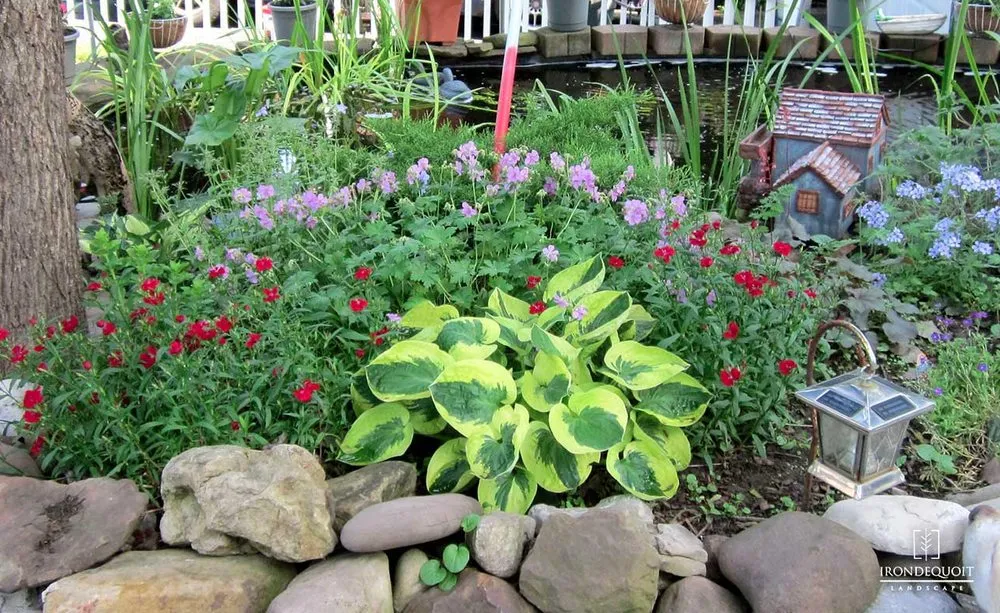 Expert lawn mowing service for homes in Rochester, NY by Irondequoit Lawn & Landscape