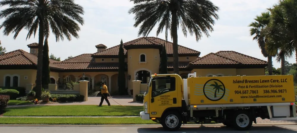 Expert lawn mowing service for residential properties in St. Augustine, FL by Island Breezes Lawn Care