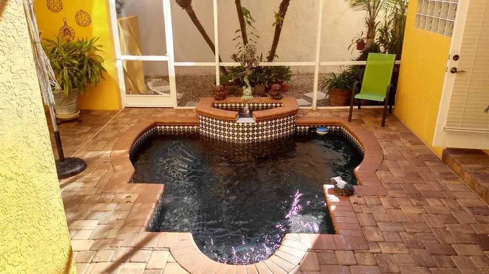 Reliable lawn mowing service for outdoor upgrades in Longboat Key, FL by Island Exteriors