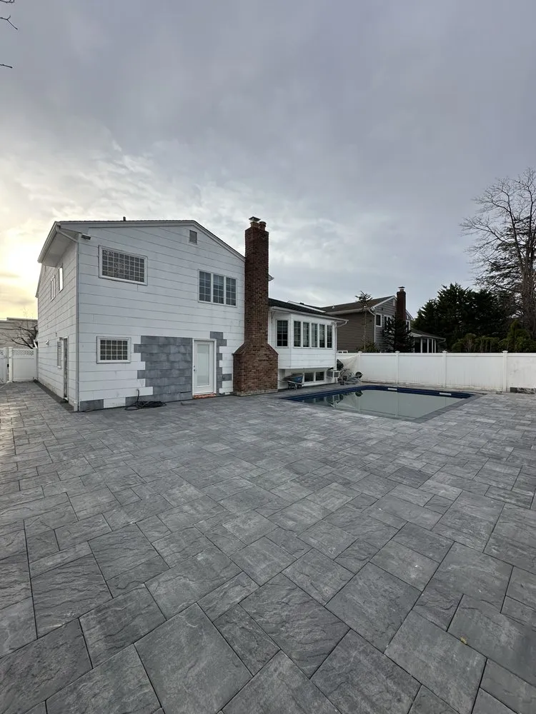 Reliable yard cleanup service for homes in Bellmore, NY by Island Greenery Masonry & Landscape