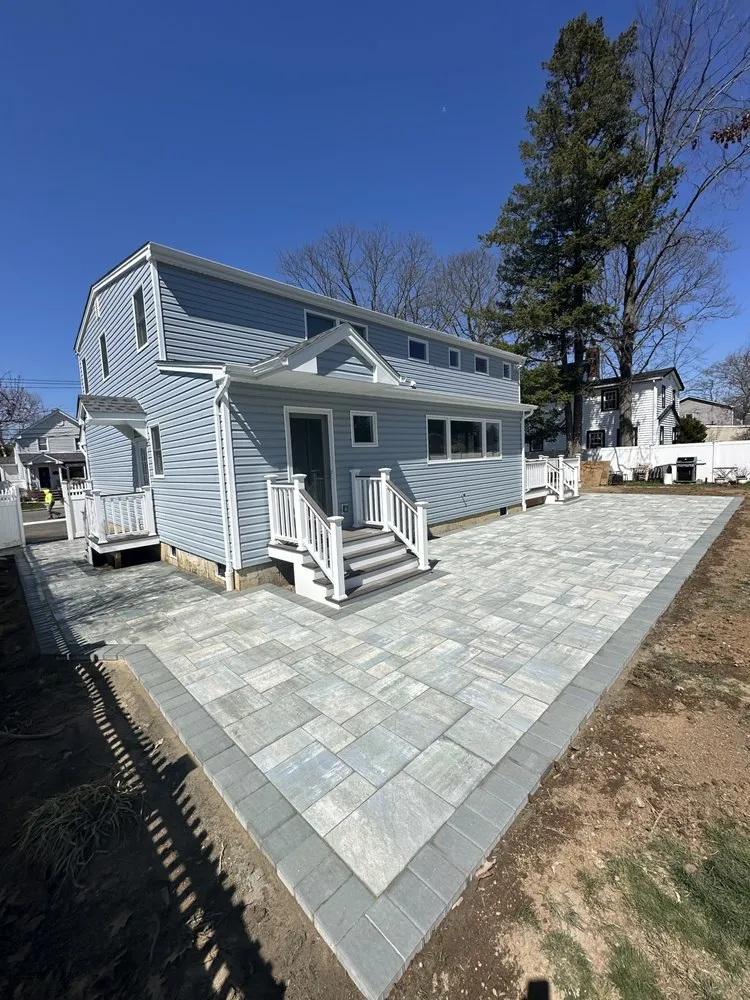 Affordable landscape installation with custom design in Bellmore, NY by Island Greenery Masonry & Landscape
