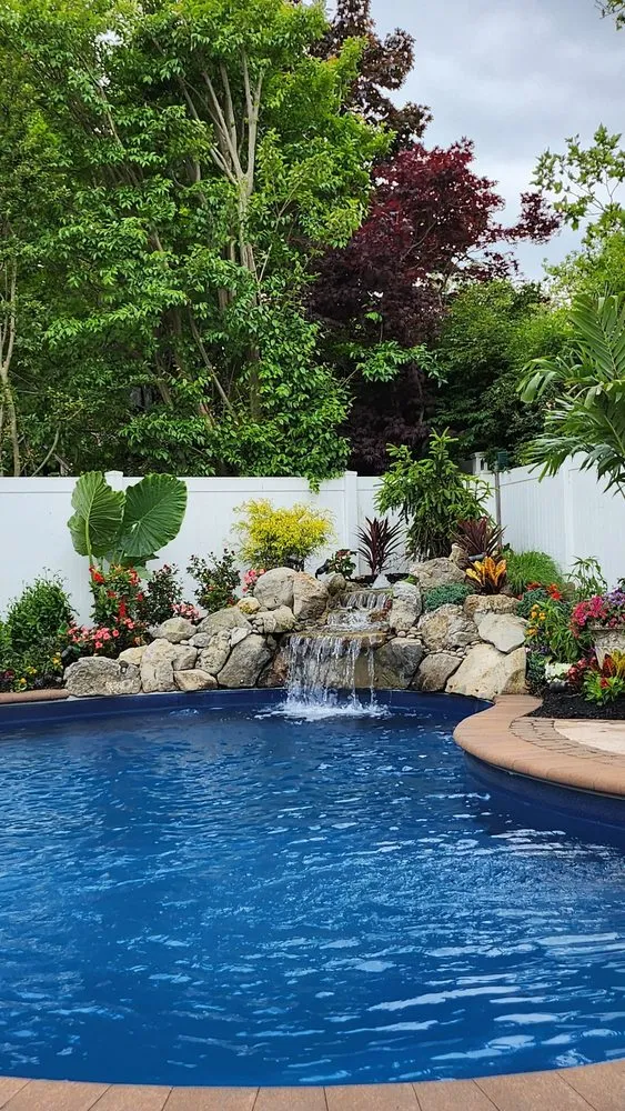 Local landscaping services for year-round maintenance in Bellmore, NY by Island Greenery Masonry & Landscape