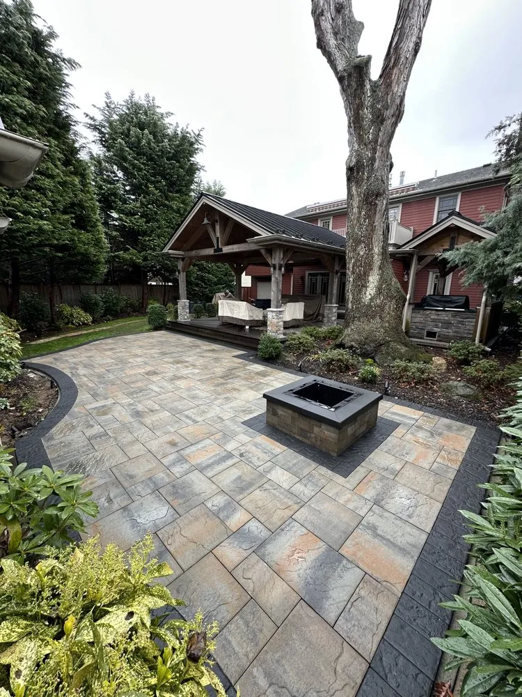 Trusted lawn mowing service for residential properties across Bellmore, NY - Island Greenery Masonry & Landscape