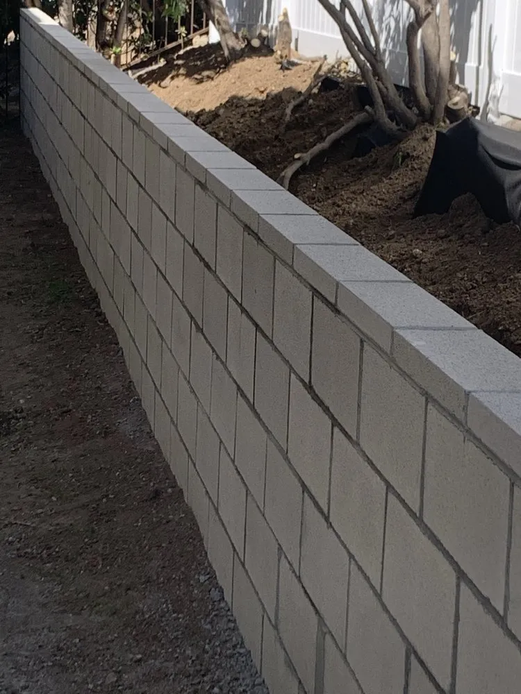 Expert lawn mowing service for outdoor upgrades in Los Angeles, CA by Island Masonry and Landscaping Construction