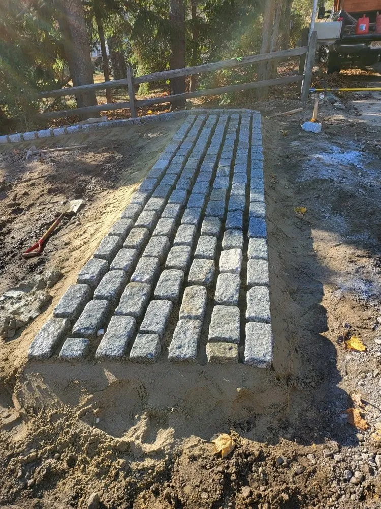 Custom landscape installation for homes in Uniondale, NY by Islas Landscaping & Masonry