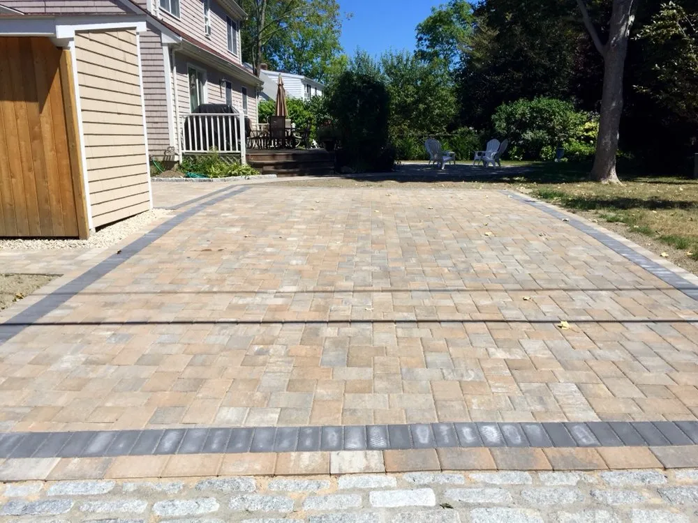 Trusted lawn mowing service for beautiful yards in Portsmouth, RI by It's About Thyme Landscape