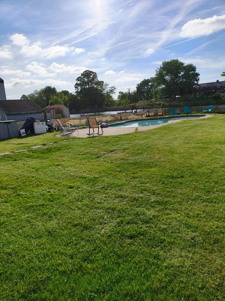 Professional yard cleanup service for residential properties across Middle River, MD - Its Just Grass