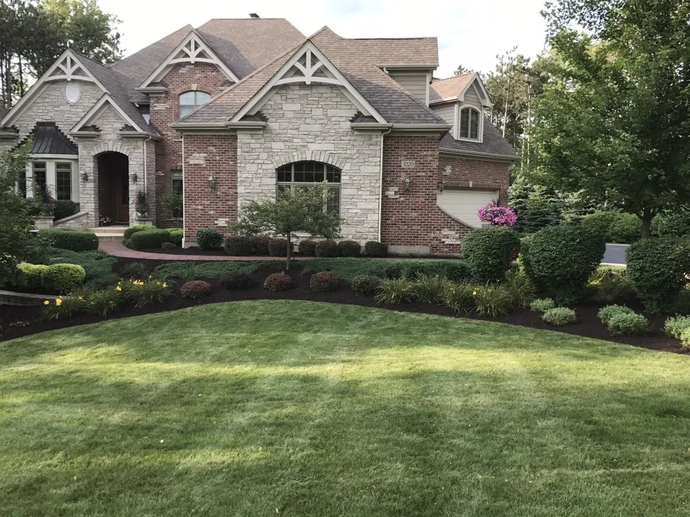 Custom landscape installation in McHenry, IL by Ivan Landscaping & Snow Removal