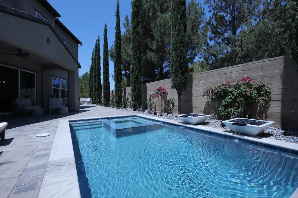 Reliable lawn mowing service for year-round maintenance in Newport Beach, CA by Ivy Builders