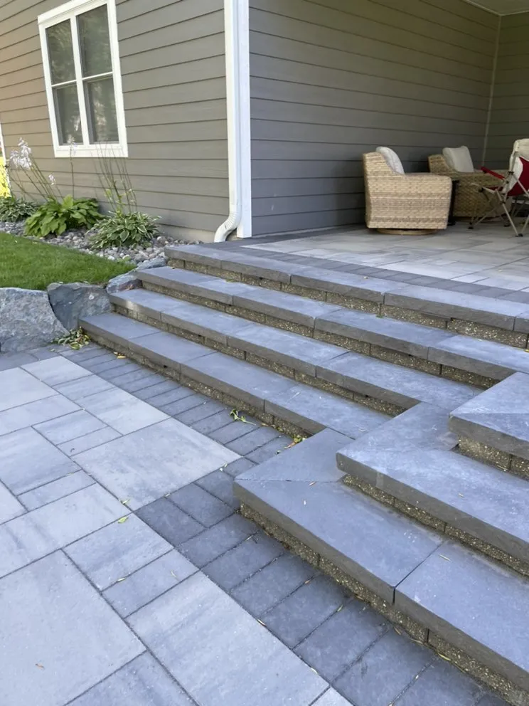 Expert yard cleanup service for residential properties in Coon Rapids, MN by Ivy Landscape By Design