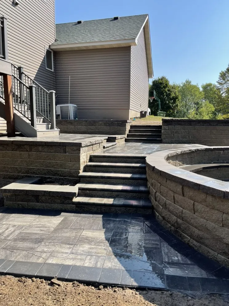 Top-rated lawn care service for homes in Coon Rapids, MN by Ivy Landscape By Design