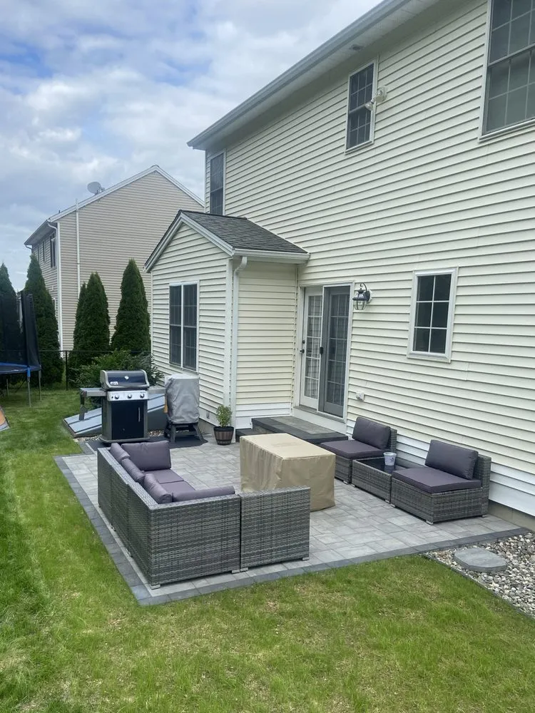 Custom lawn mowing service for homes in Oxford, CT by Ivy Terrain Design