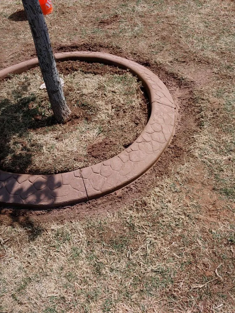 Custom outdoor landscaping with custom design in Abernathy, TX by J & B MaxCurbing