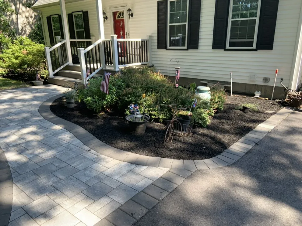 Trusted outdoor landscaping with custom design in Coram, NY by J & D Property Improvements