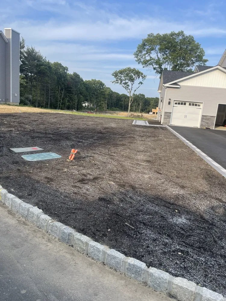 Professional garden landscaping for residential properties in Mastic Beach, NY by J & E Lawn Care And Tree Service