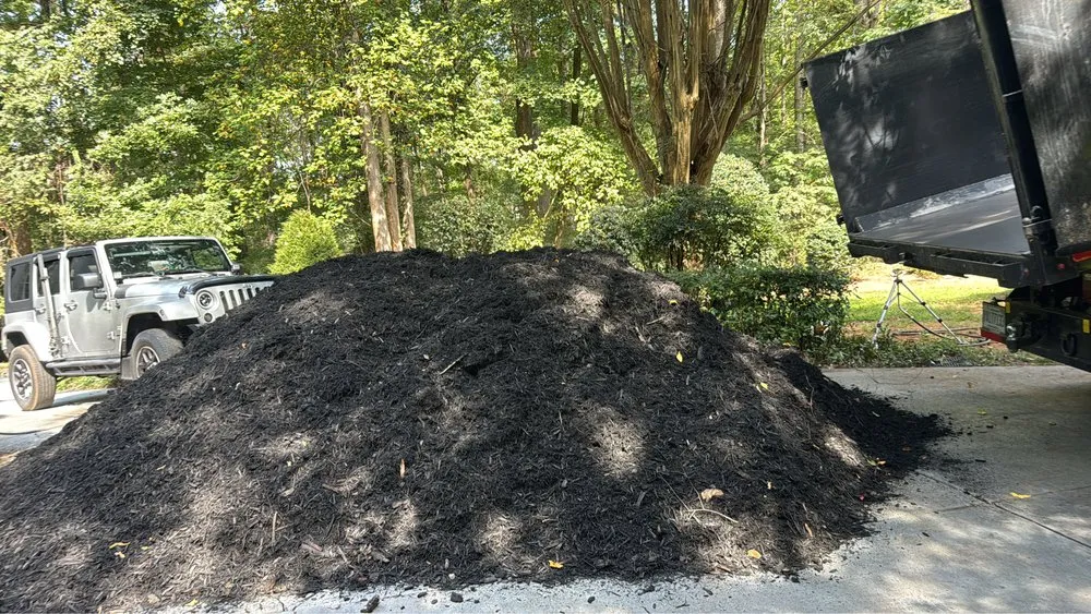 Custom landscape installation for outdoor upgrades in Charlotte, NC by J & G Landscaping & Tree Service