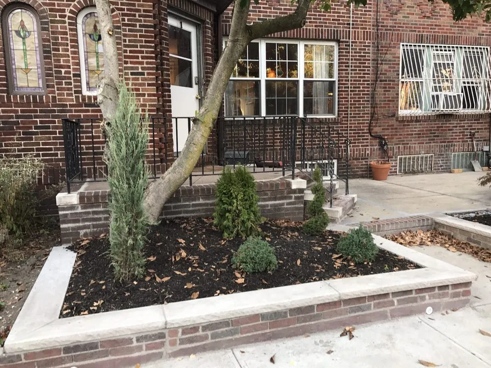 Custom yard cleanup service in Ozone Park, NY by J & H Landscaping