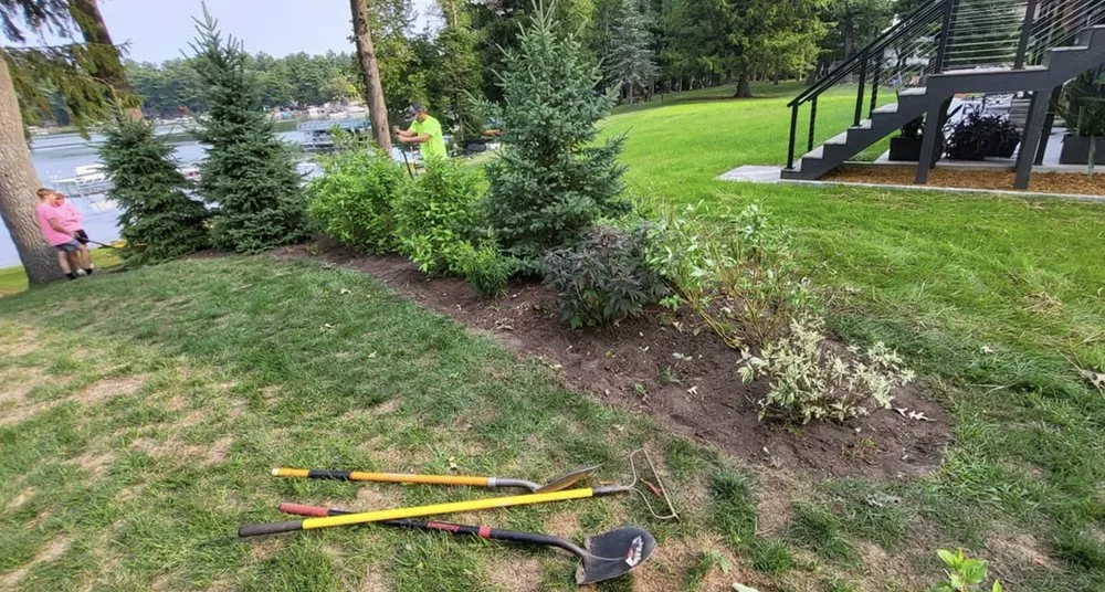Custom lawn mowing service with custom design across Weyauwega, WI - J & H Lawn Care
