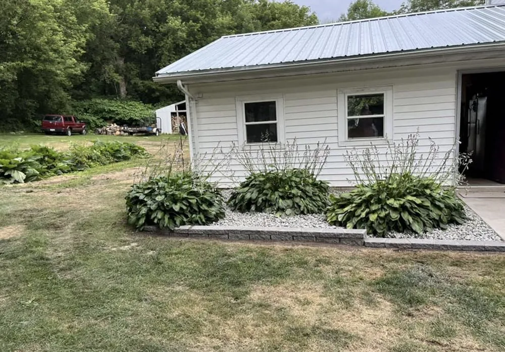 Local landscape design experts serving Weyauwega, WI - J & H Lawn Care