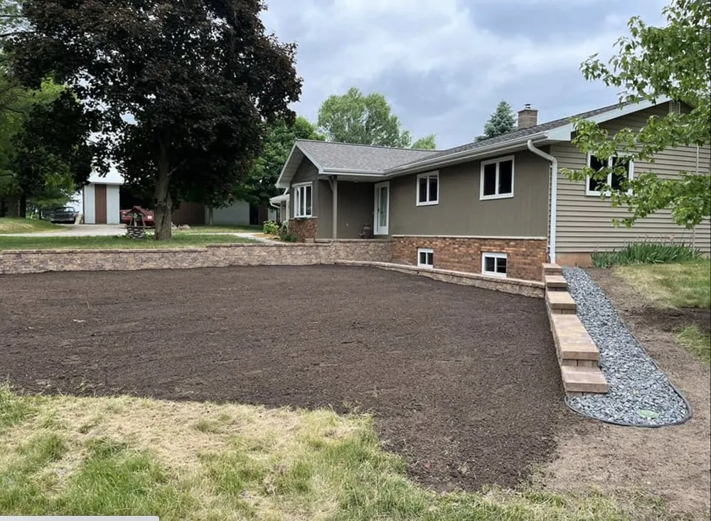 Custom yard cleanup service for outdoor upgrades in Weyauwega, WI by J & H Lawn Care