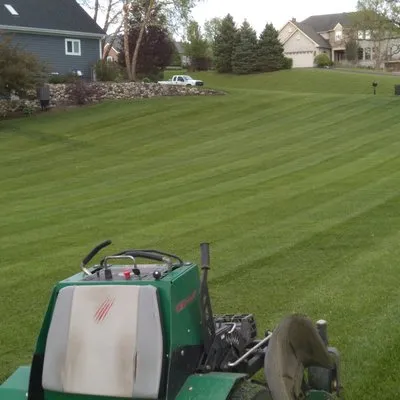 J & J Escobar Landscaping Logo