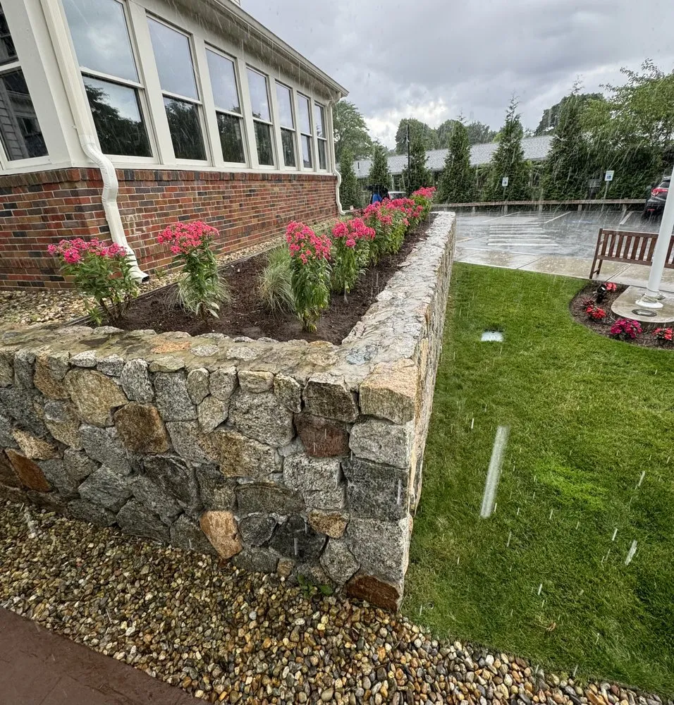 Custom landscape design with custom design across Boston, MA - J & J Home Improvement